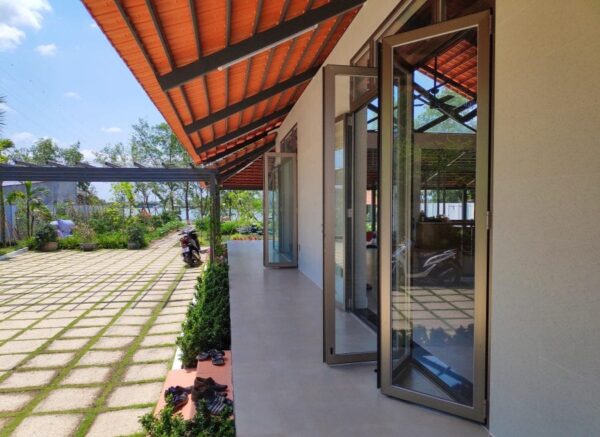 Sliding folding glass doors allow natural sunlight and breeze to flow into your home.