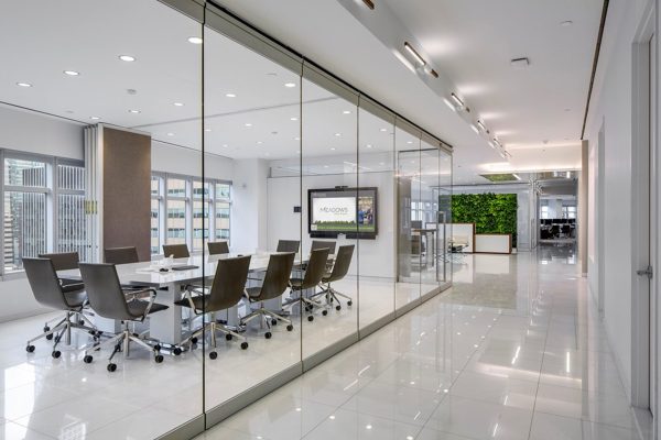 Aluminum glass partitions help create spacious and airy office layouts.